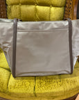 GRAY/BROWN TUMI BAG