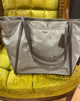 GRAY/BROWN TUMI BAG