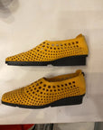 MUSTARD ARCHE CUTOUT FLATS 40