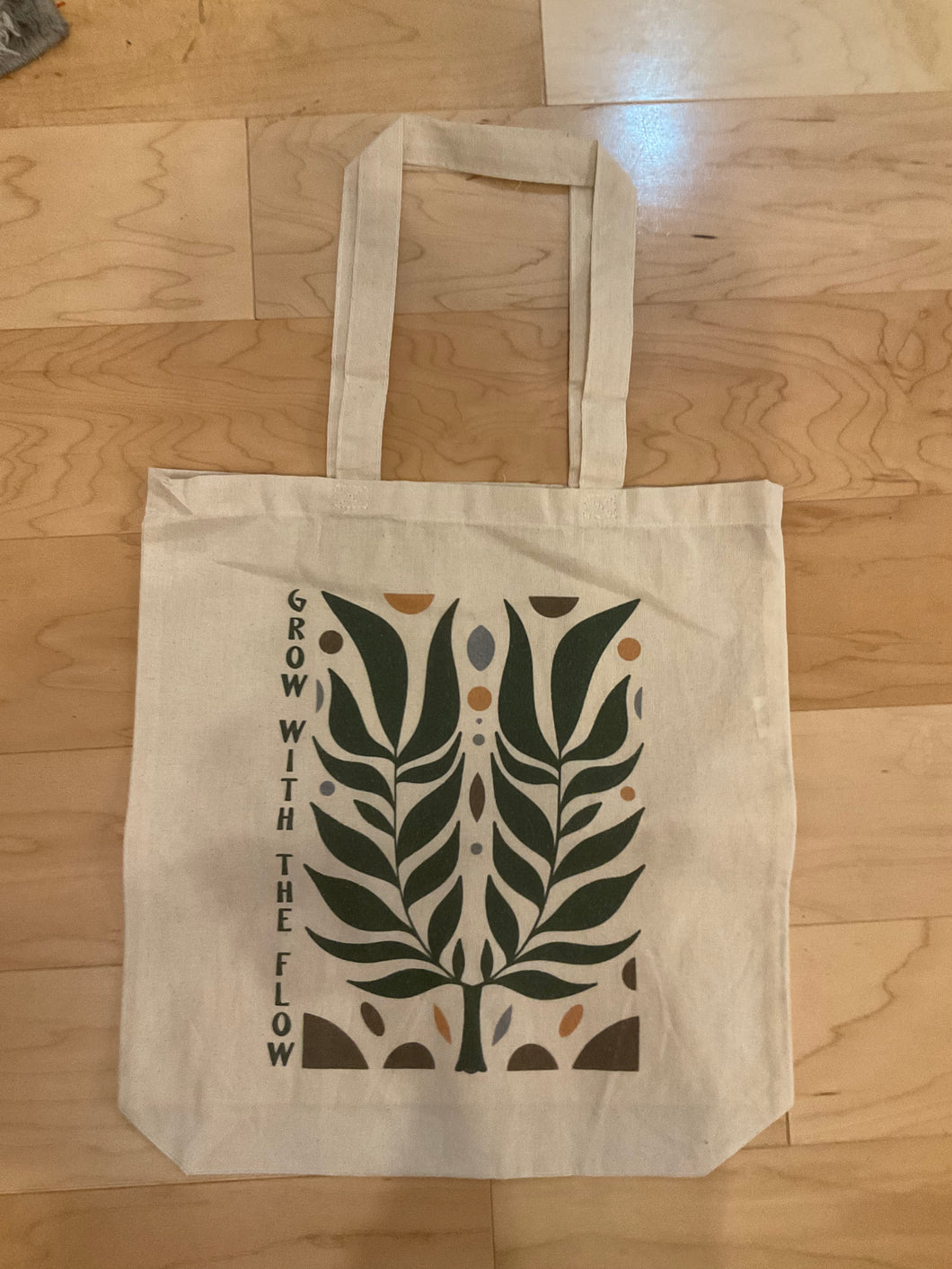 Grow with the flow tote bag