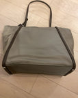 GRAY/BROWN TUMI BAG