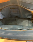 {{ClientCode}} BLUE COACH PURSE