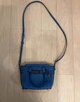 {{ClientCode}} BLUE COACH PURSE