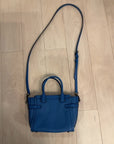 {{ClientCode}} BLUE COACH PURSE